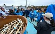 Students and staff on board an oyster barge.